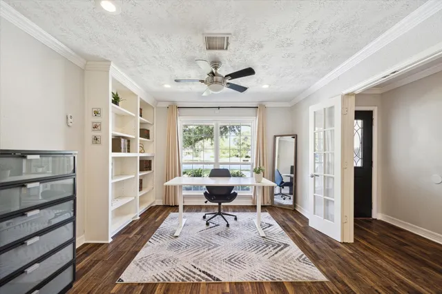 a living room with furniture rug and window