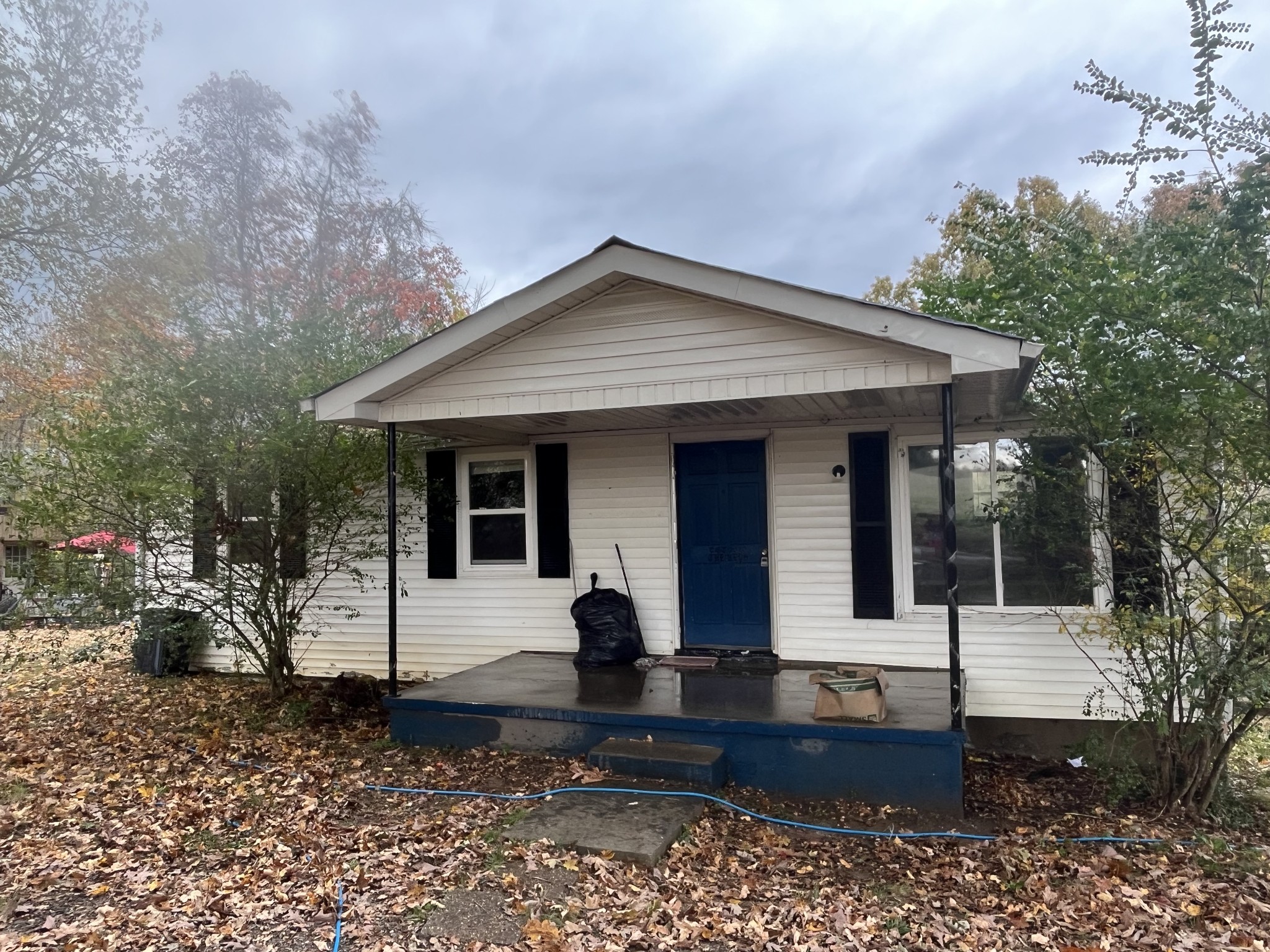 a front view of a house with yard