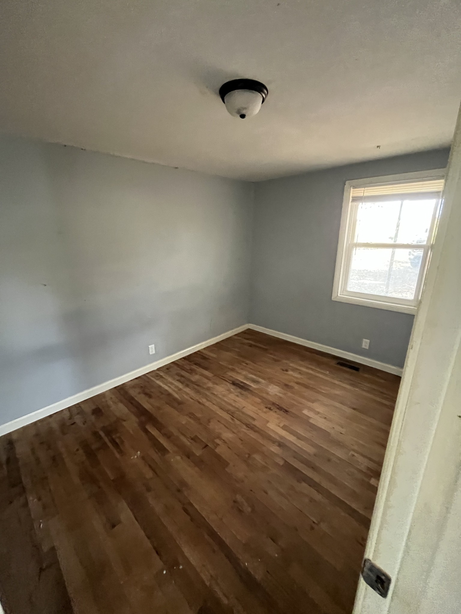 540 Austin Branch Road Portland, TN 37148 - Photo 8 of 8 an empty room with windows