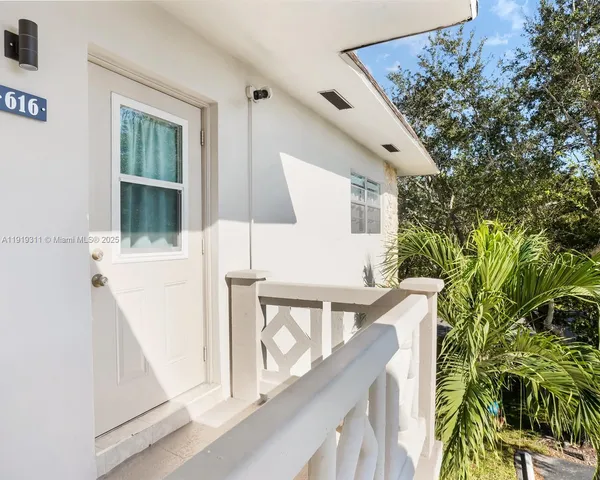 a view of balcony with furniture