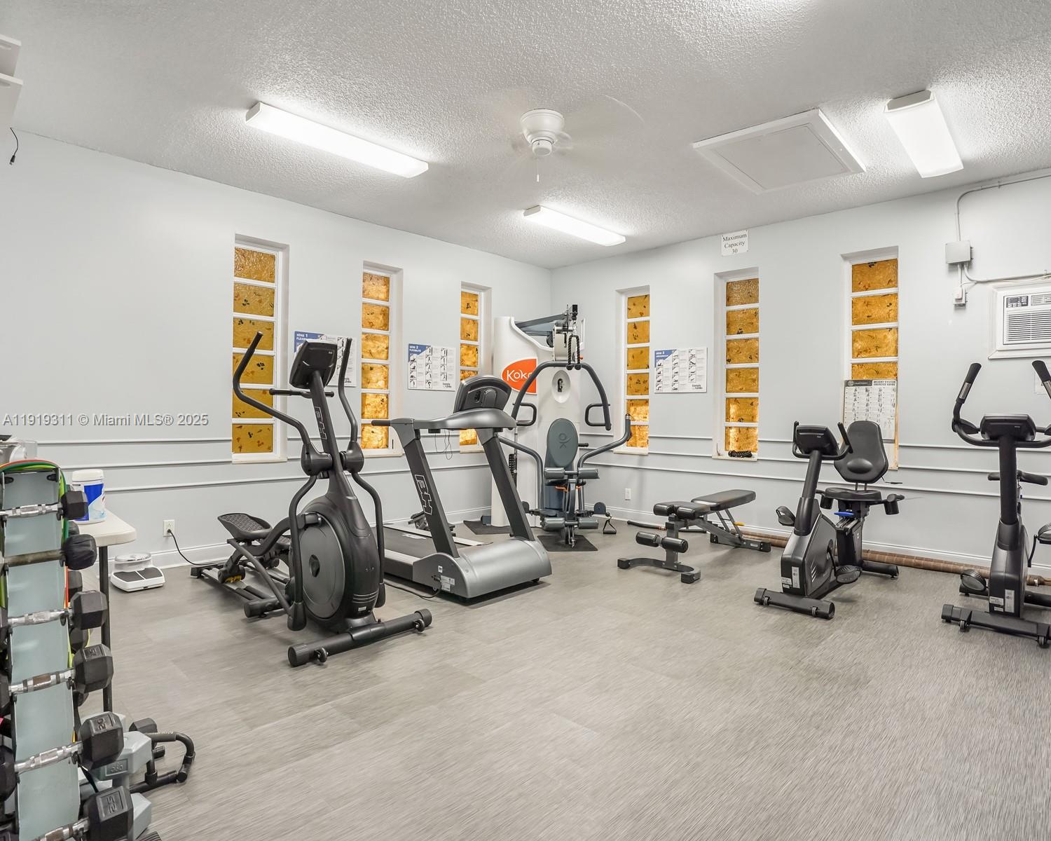 4705 Northwest 35th Street, Unit 616 Lauderdale Lakes, FL 33319 - Photo 24 of 33 a view of a room with gym equipment