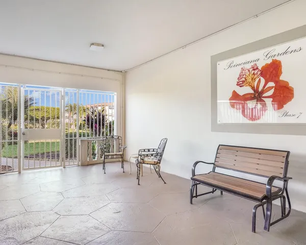 a view of a livingroom with furniture and a couch