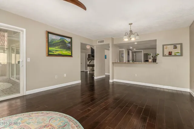 a view interior of a house wooden floor and an entryway