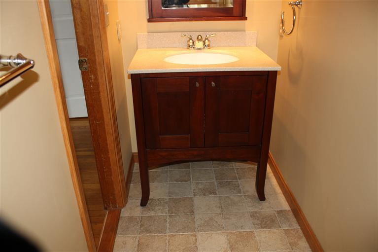 127 Suomi Road Hyannis, MA 02601 - Photo 9 of 15 a bathroom with a sink and a mirror