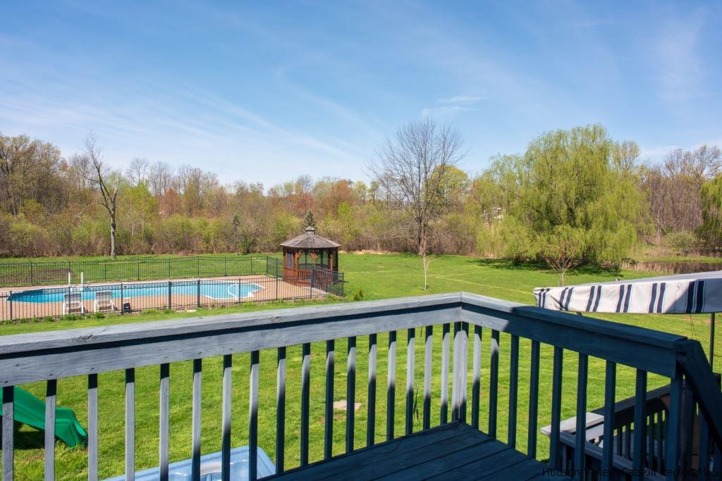 46 Patura Road Modena, NY 12548 - Photo 13 of 26 a view of a roof deck with wooden floor and fence