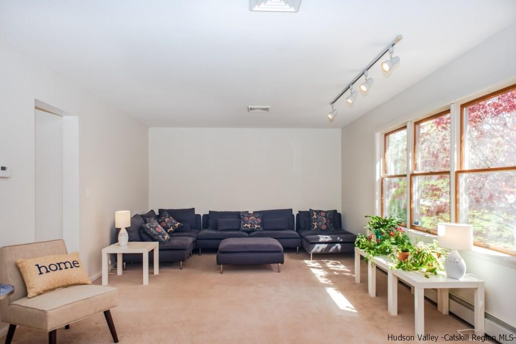 46 Patura Road Modena, NY 12548 - Photo 17 of 26 a living room with furniture and a large window