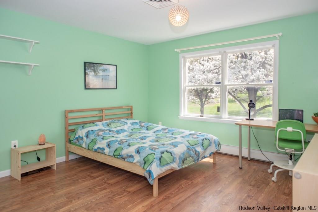 46 Patura Road Modena, NY 12548 - Photo 20 of 26 a bedroom with a bed and a large window