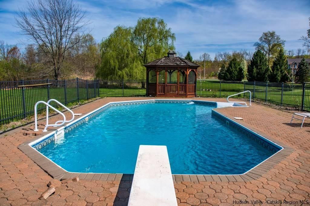 46 Patura Road Modena, NY 12548 - Photo 2 of 26 a view of a swimming pool with a patio