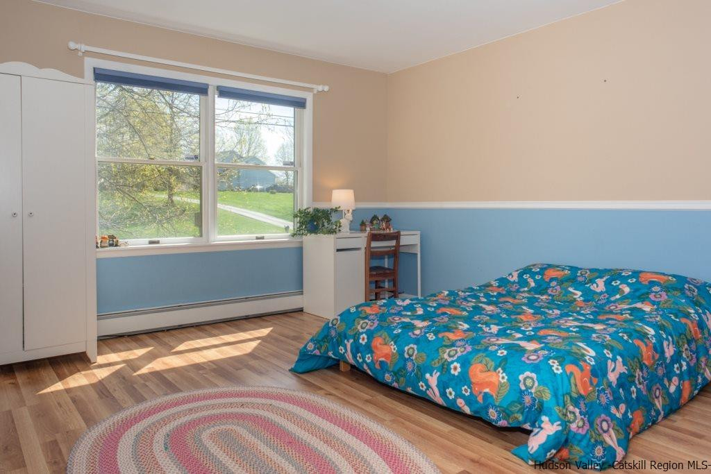 46 Patura Road Modena, NY 12548 - Photo 21 of 26 a bedroom with a bed and a window in it
