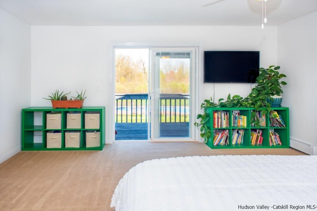 46 Patura Road Modena, NY 12548 - Photo 22 of 26 a bedroom with a bed and a flat screen tv