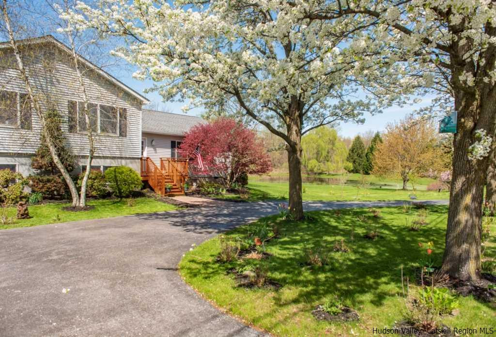 46 Patura Road Modena, NY 12548 - Photo 9 of 26 a backyard of a house with barbeque oven table and chairs