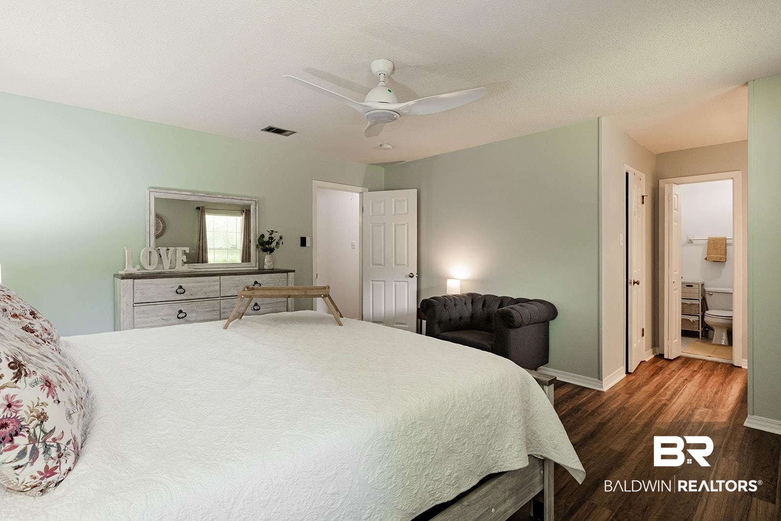 2920 Quail Creek Run Mobile, AL 36695 - Photo 18 of 33 Bedroom with dark wood-style flooring, a ceiling fan, and ensuite bathroom