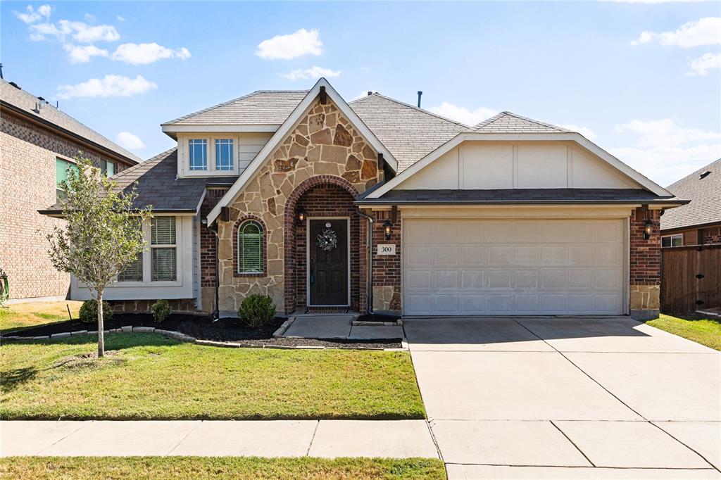 300 Salisbury Drive Anna, TX 75409 - Photo 1 of 1 a front view of a house with a yard