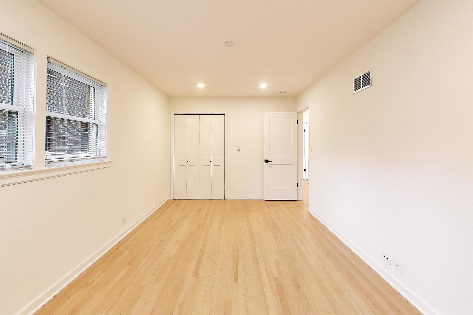 832 North Delphia Avenue Park Ridge, IL 60068 - Photo 11 of 29 a view of empty room with window and wooden floor