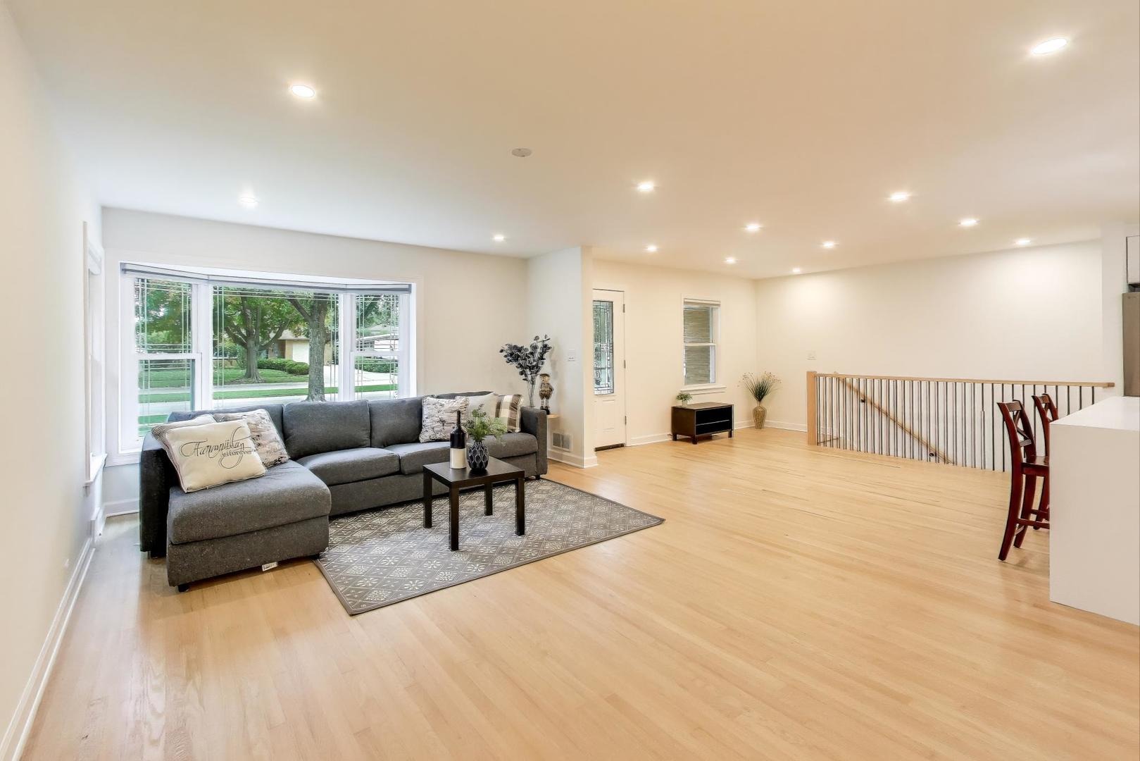 832 North Delphia Avenue Park Ridge, IL 60068 - Photo 3 of 29 a living room with furniture and a large window