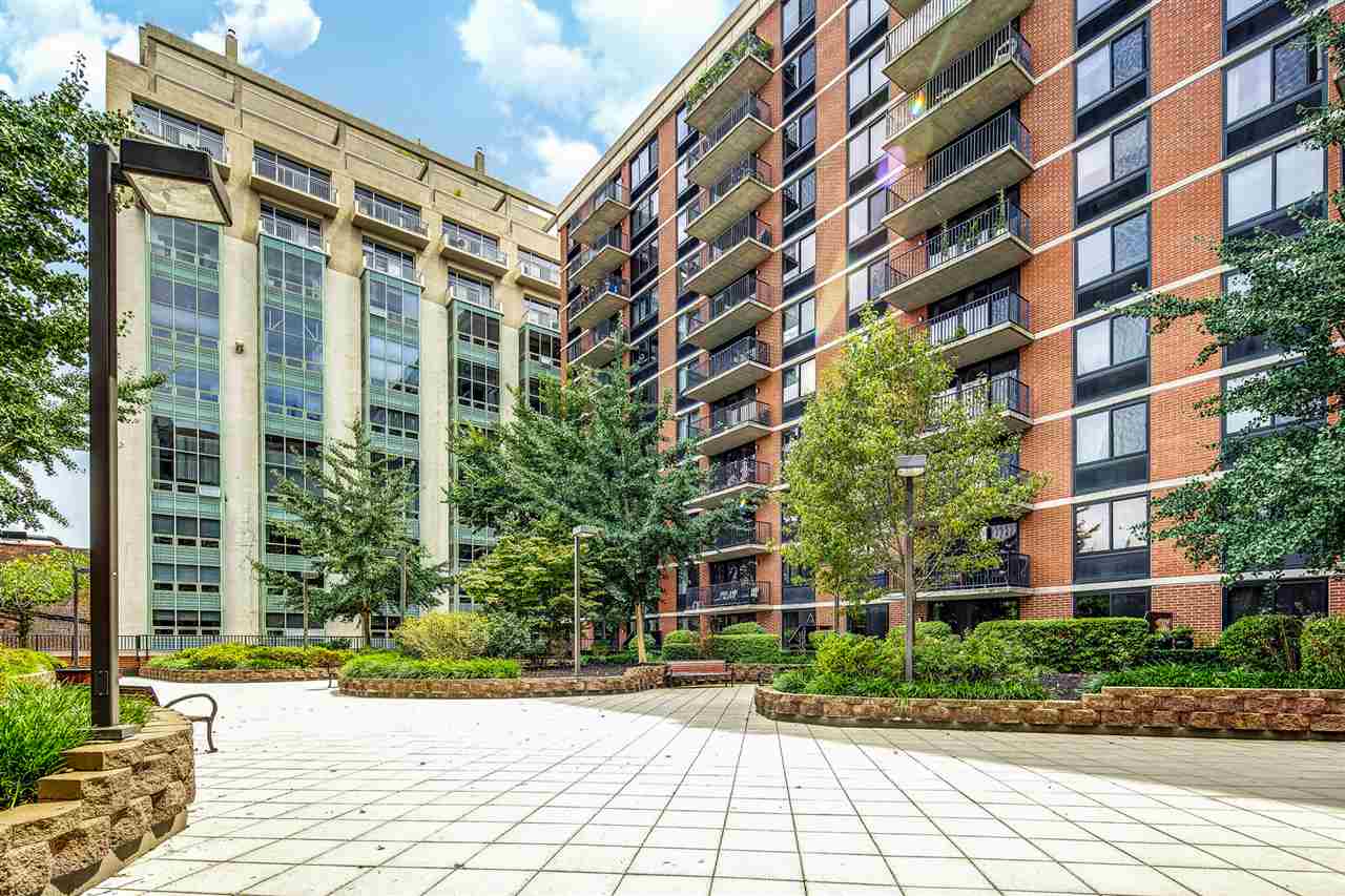 700 Grove Street, Unit 4V Jersey City, NJ 07310 - Photo 21 of 25 a view of a building with a street