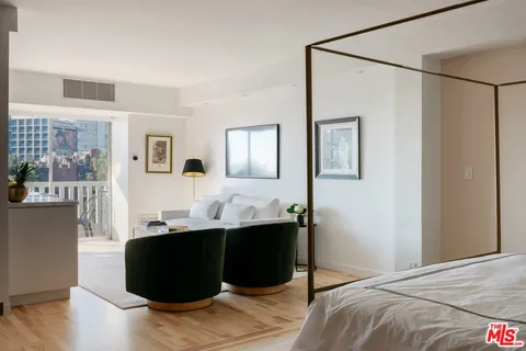 a living room with a couch and a table