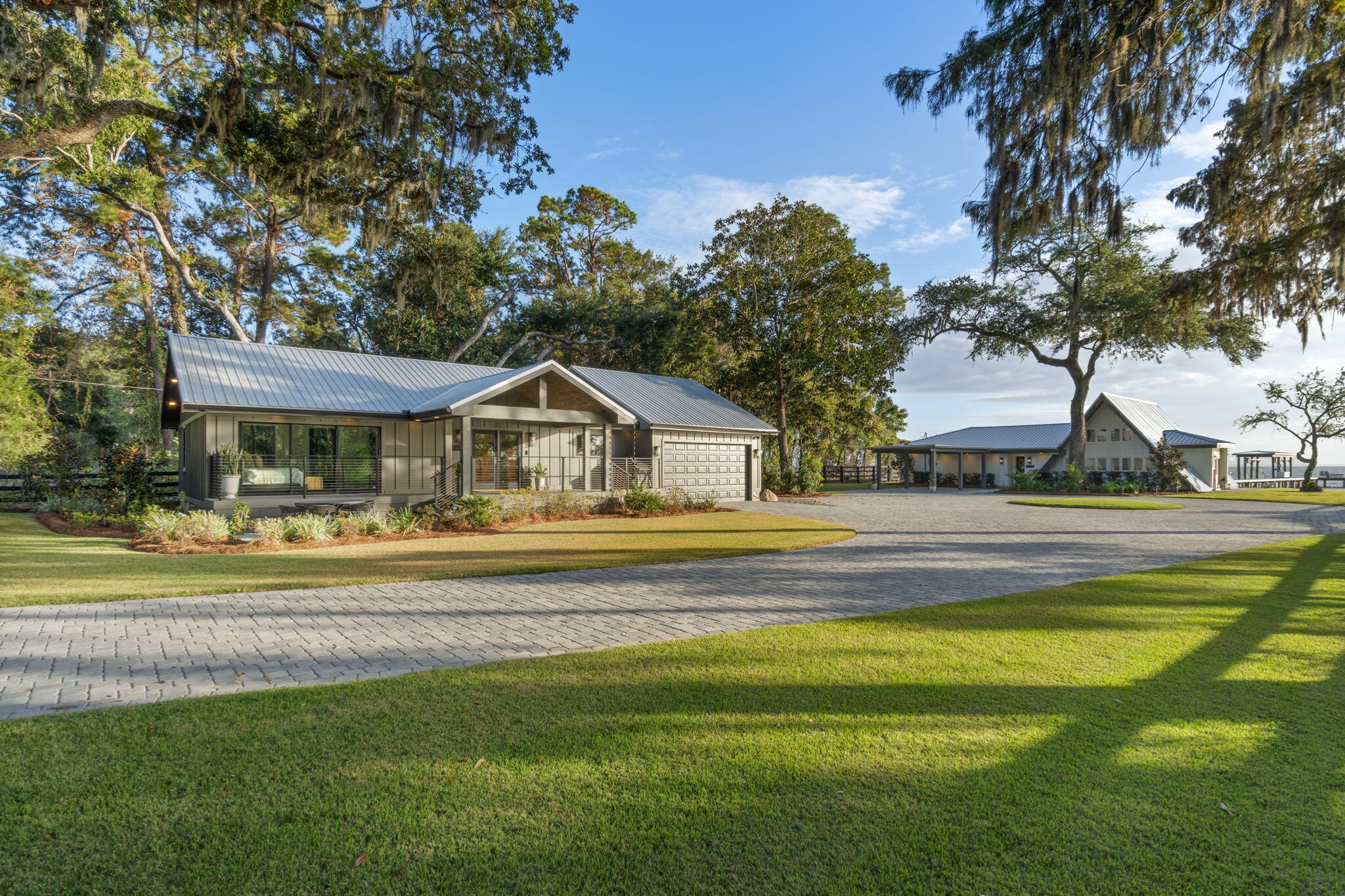 7423-7433 Highway 20 Freeport, FL 32439 - Photo 1 of 69 a front view of a house with a yard table and chairs