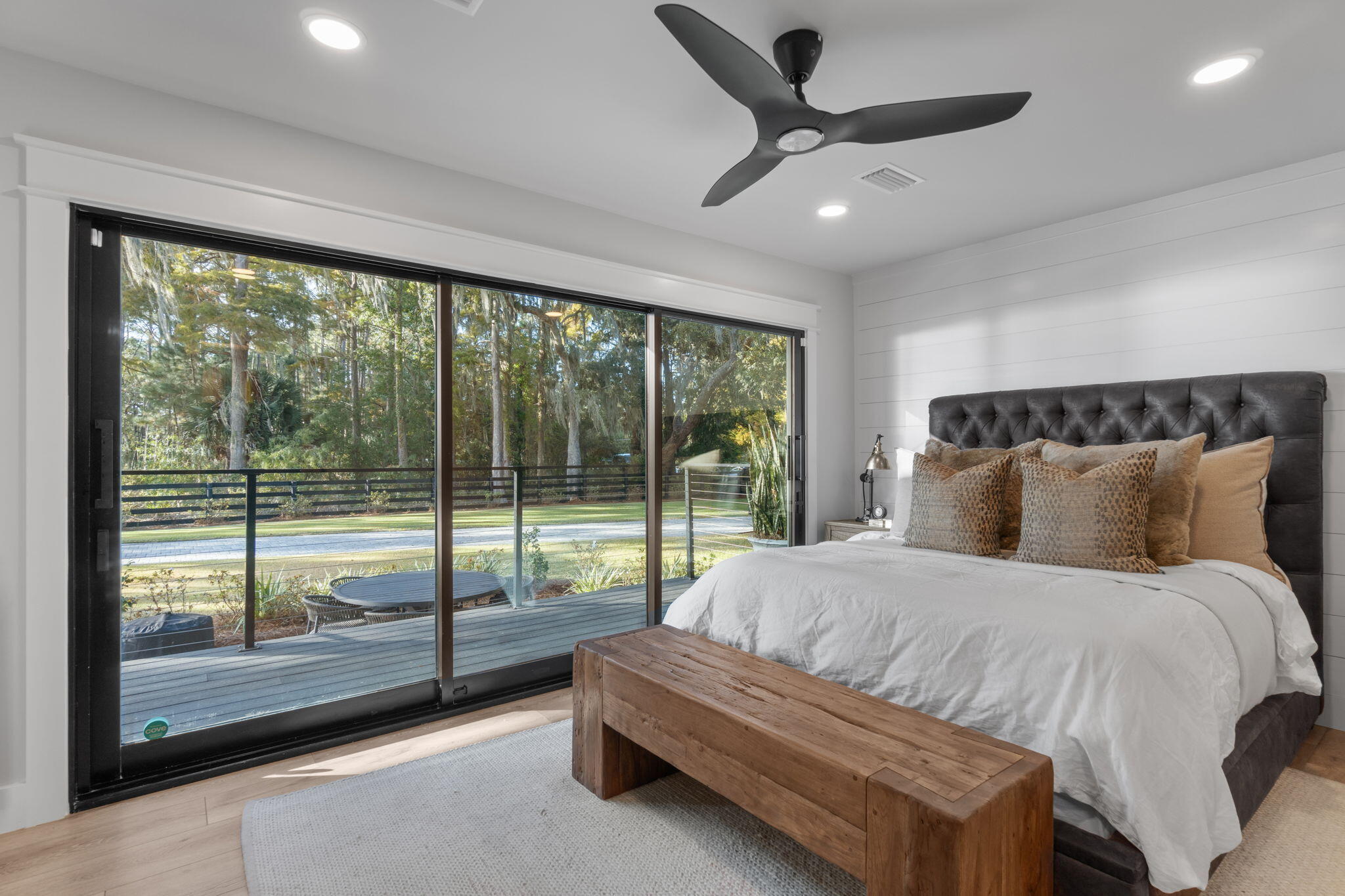 7423-7433 Highway 20 Freeport, FL 32439 - Photo 16 of 69 a bedroom with a large bed and a large window