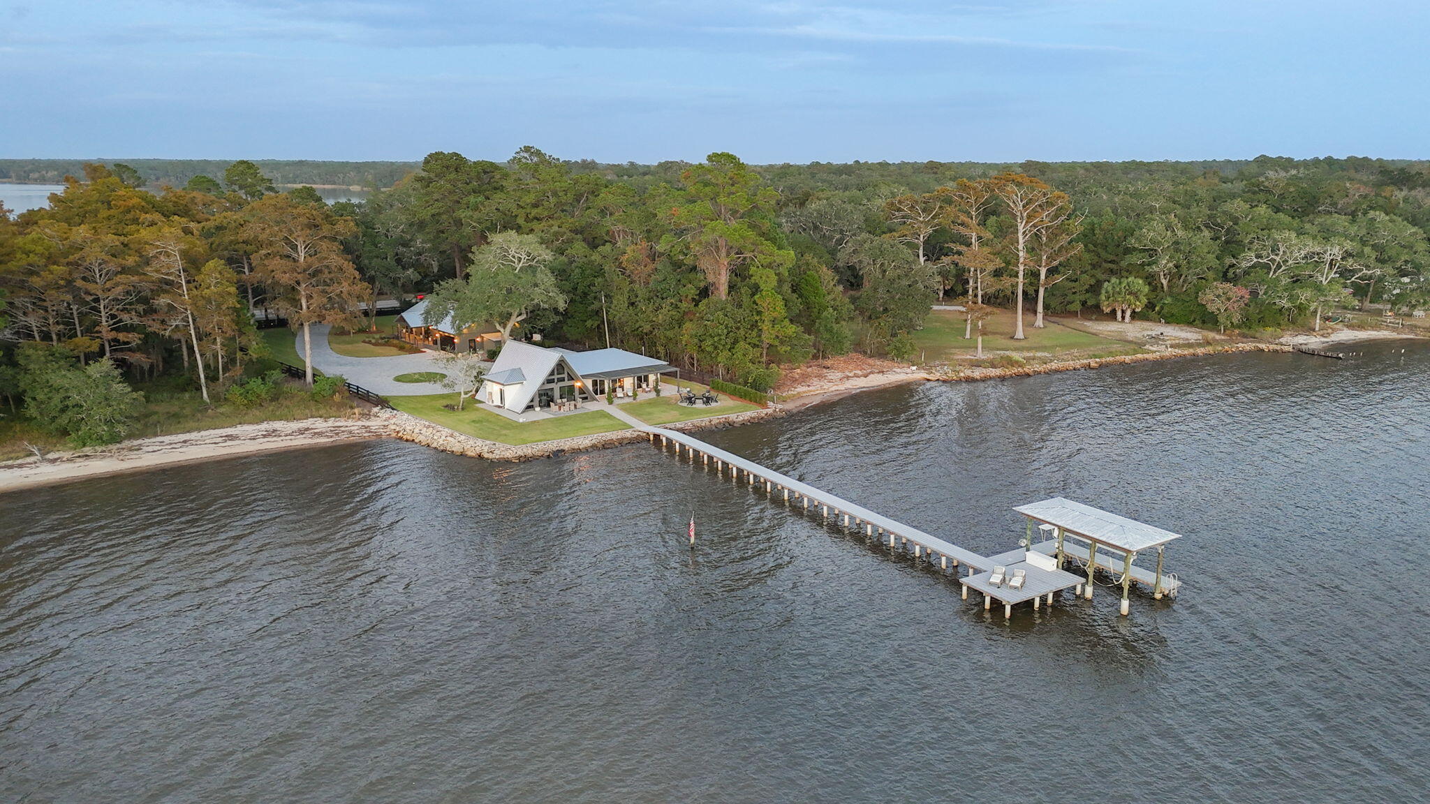 7423-7433 Highway 20 Freeport, FL 32439 - Photo 2 of 69 a view of a lake with mountain