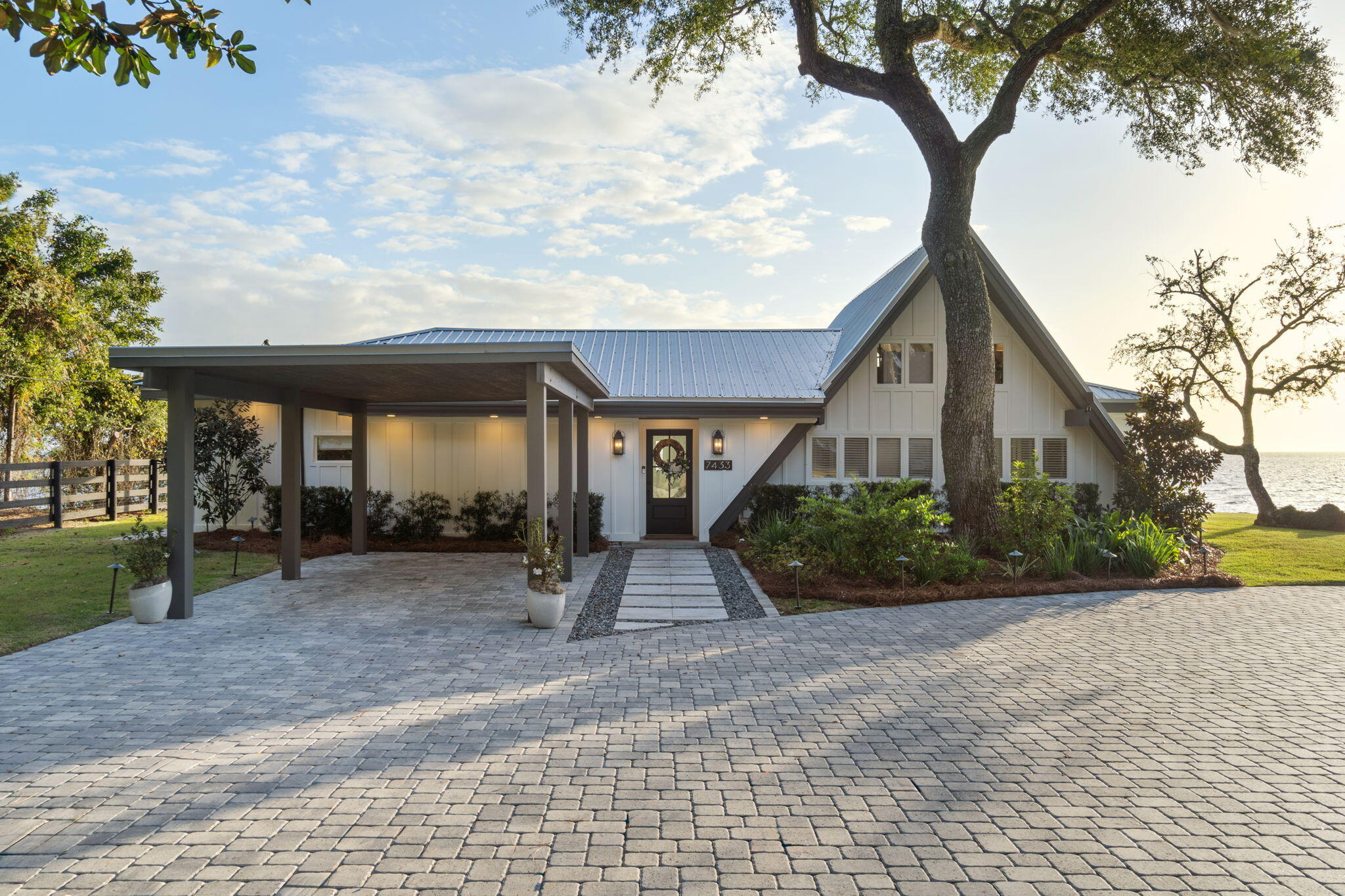 7423-7433 Highway 20 Freeport, FL 32439 - Photo 29 of 69 a front view of a house with a yard