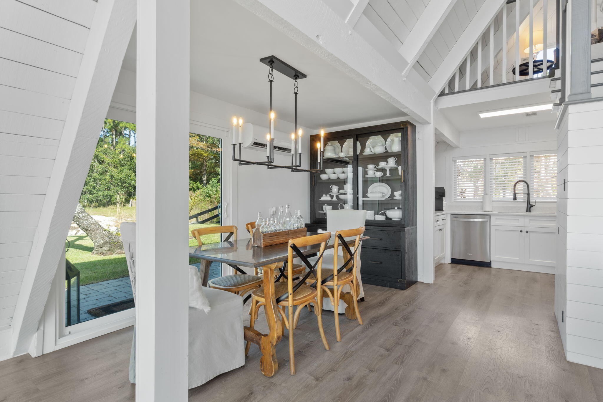 7423-7433 Highway 20 Freeport, FL 32439 - Photo 38 of 69 a view of a dining room with furniture window and wooden floor