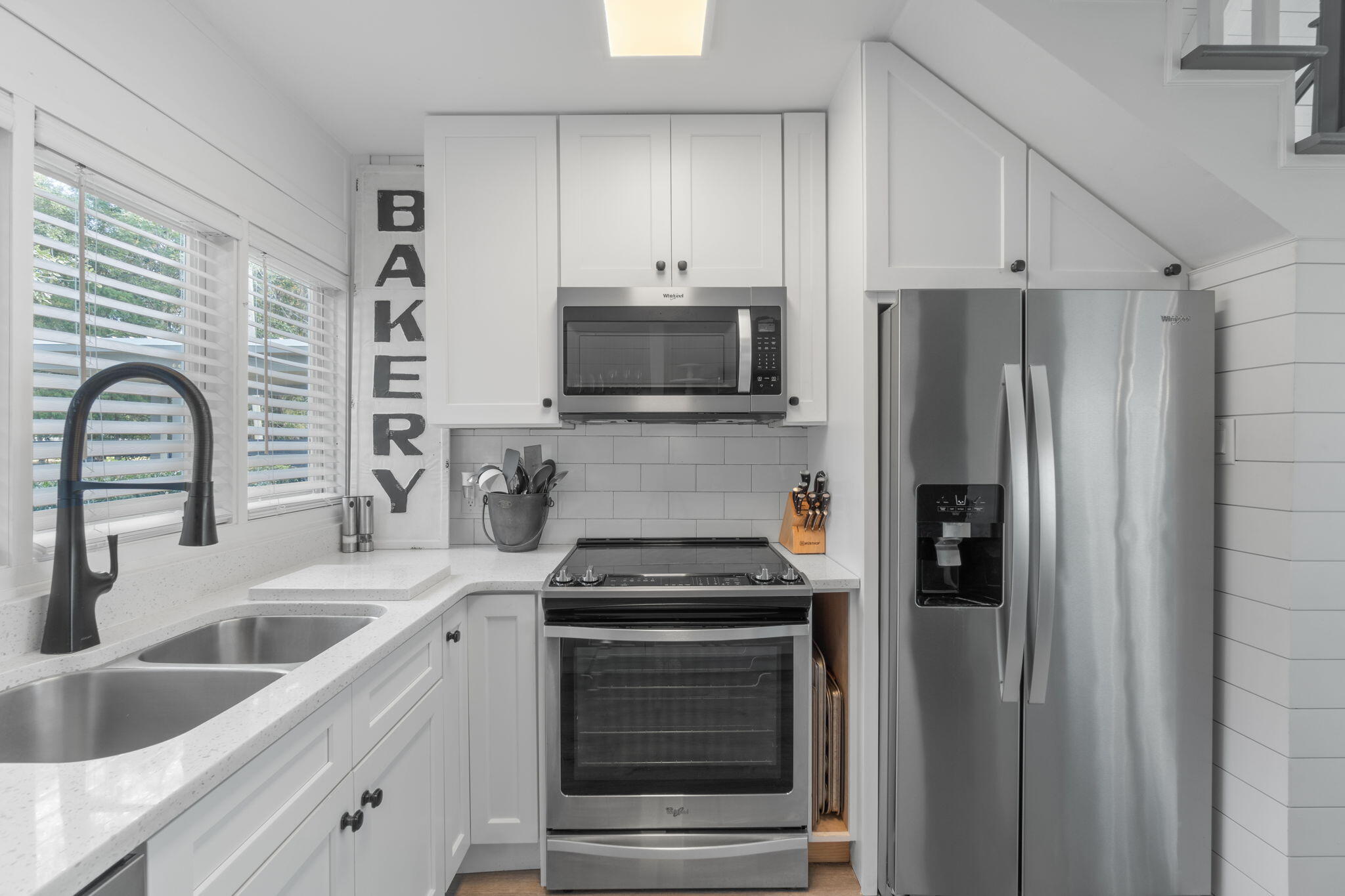7423-7433 Highway 20 Freeport, FL 32439 - Photo 41 of 69 a kitchen with granite countertop a refrigerator stove and sink