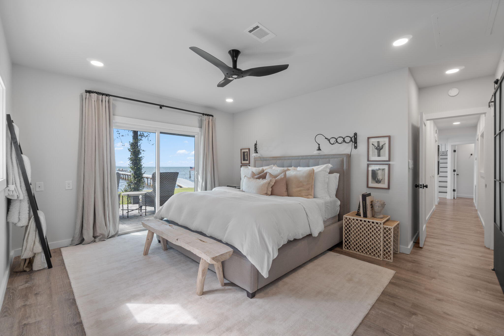 7423-7433 Highway 20 Freeport, FL 32439 - Photo 53 of 69 a spacious bedroom with a large bed and a large window