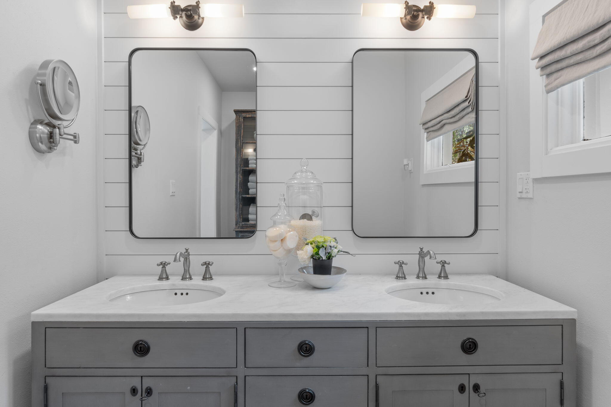 7423-7433 Highway 20 Freeport, FL 32439 - Photo 56 of 69 a bathroom with double vanity sinks and a mirror