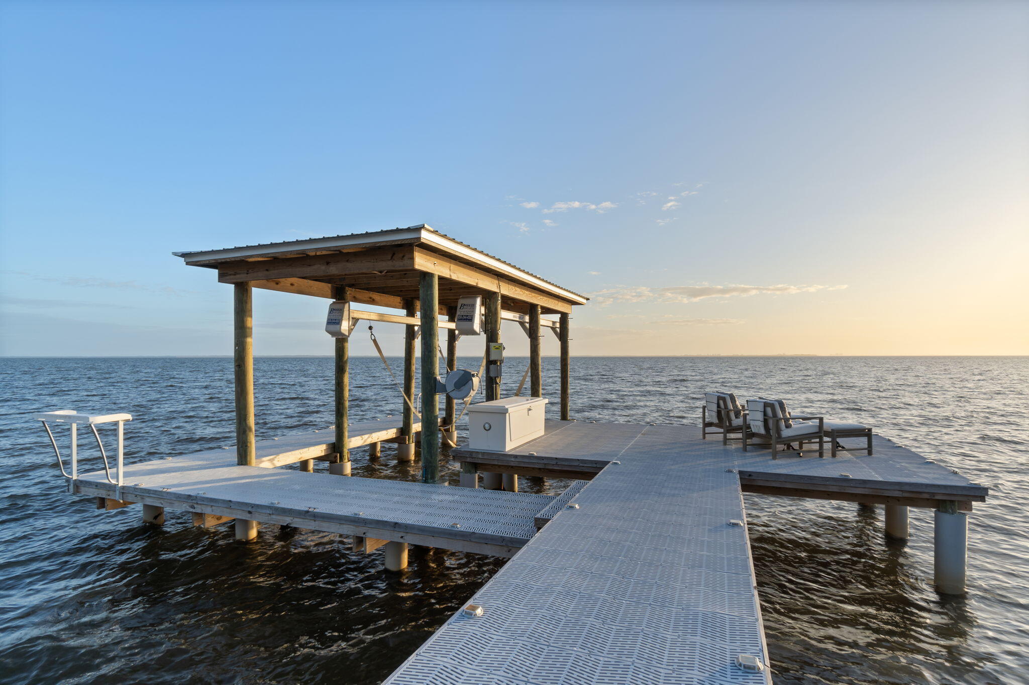 7423-7433 Highway 20 Freeport, FL 32439 - Photo 64 of 69 a view of a roof deck with couches and wooden floor