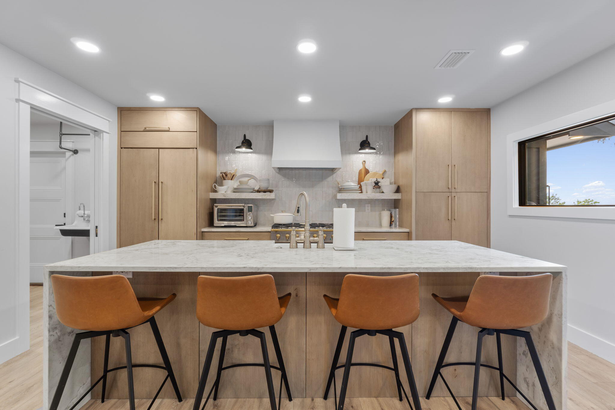 7423-7433 Highway 20 Freeport, FL 32439 - Photo 9 of 69 a kitchen with stainless steel appliances granite countertop a table chairs sink and cabinets
