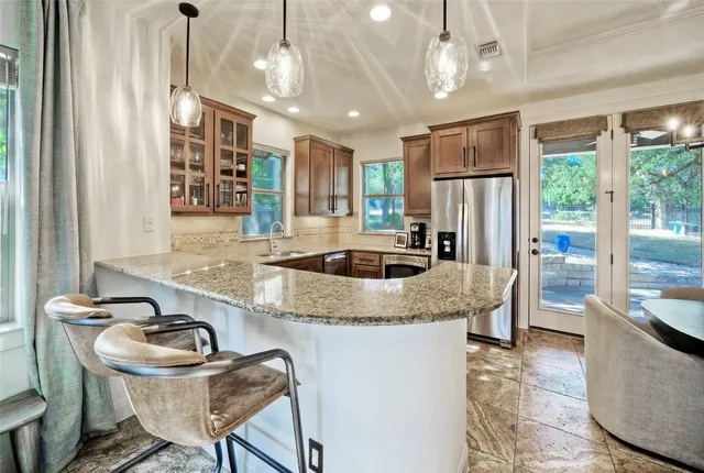 $489,000 | 14501 Falcon Head Boulevard, Unit 28, Austin, TX 78738