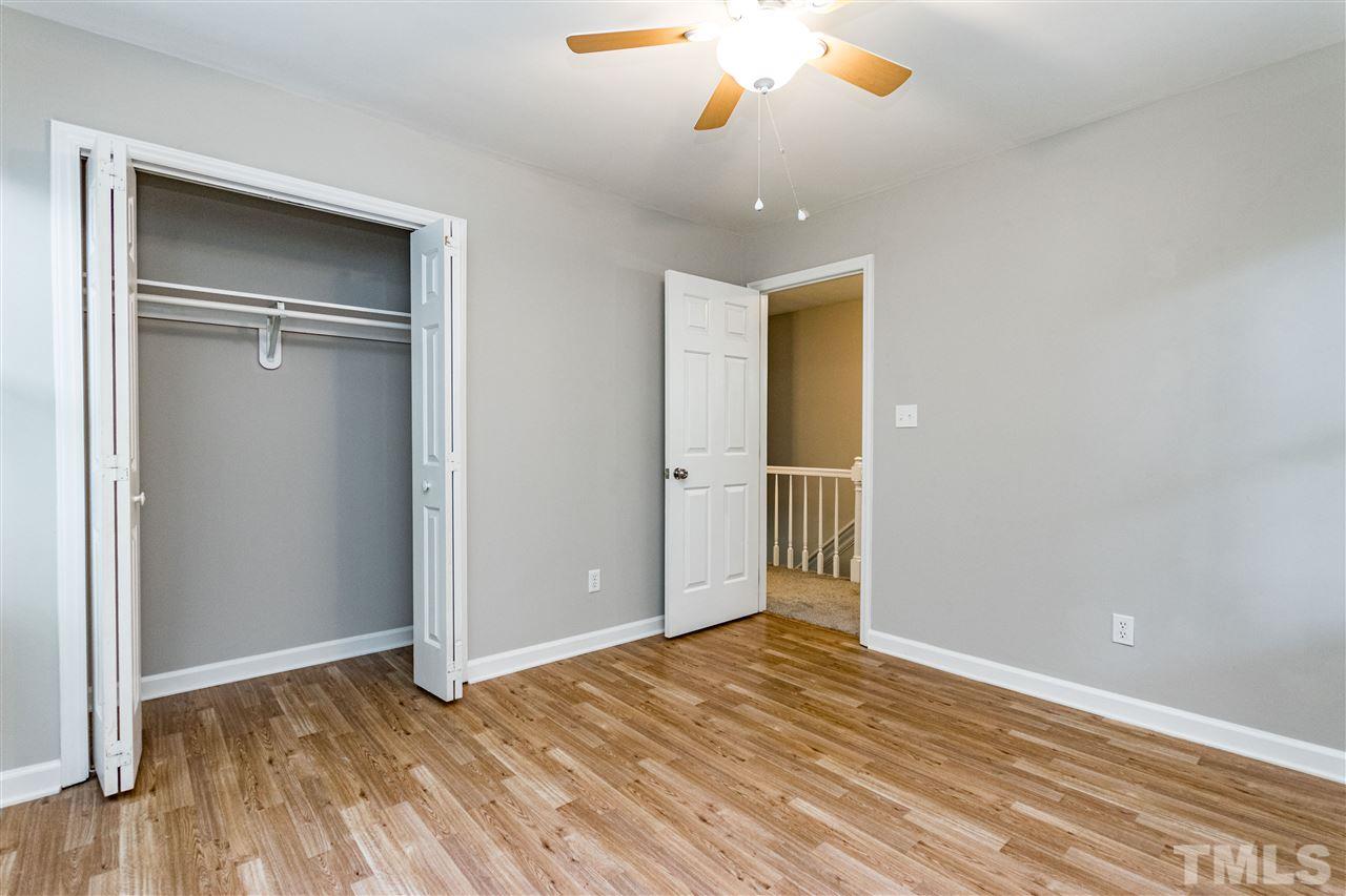 7301 Quinby Court Raleigh, NC 27613 - Photo 17 of 23 front bedroom with walk in closet