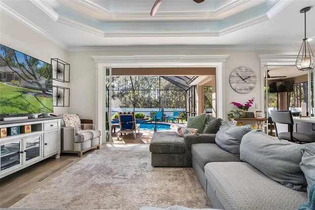 a view of a bedroom with a bed and a window