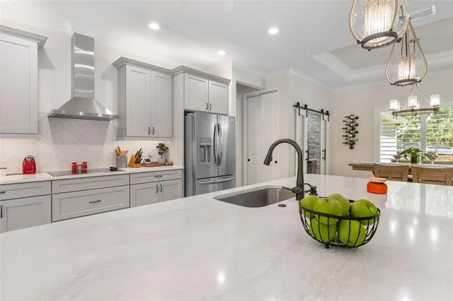 a view of a garage with furniture and a garage