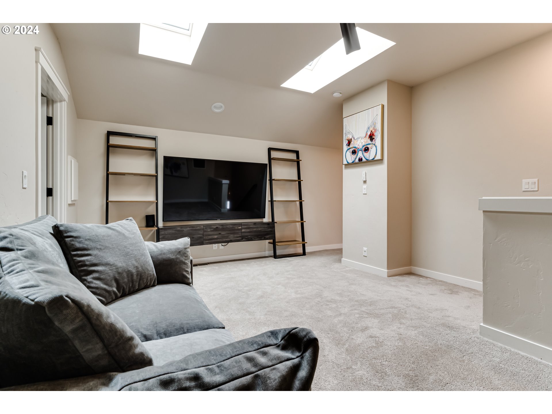 3744 Siletz Drive Eugene, OR 97408 - Photo 21 of 31 a living room with furniture and a flat screen tv