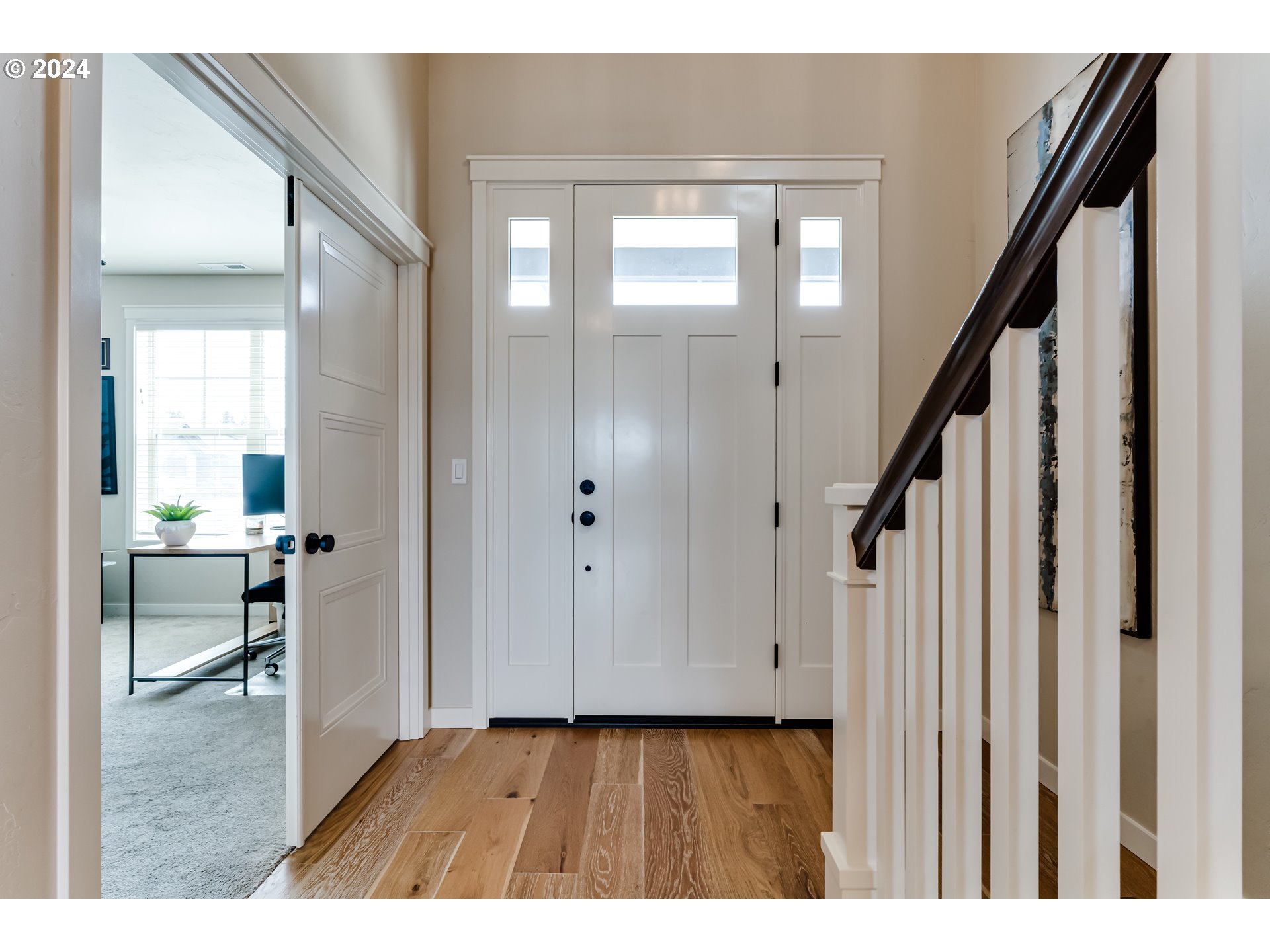 3744 Siletz Drive Eugene, OR 97408 - Photo 5 of 31 a view of an entryway with wooden floor and a bathroom