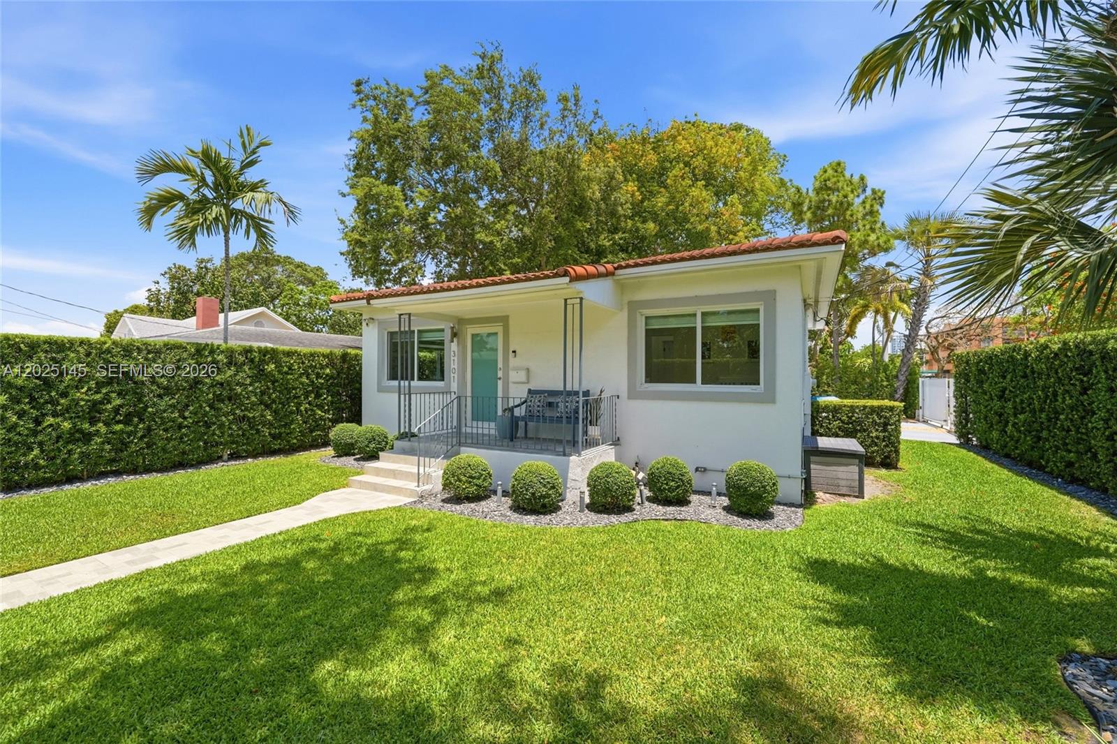 3101 Southwest 25th Terrace Miami, FL 33133 - Photo 1 of 31 a view of a house with a backyard and a patio