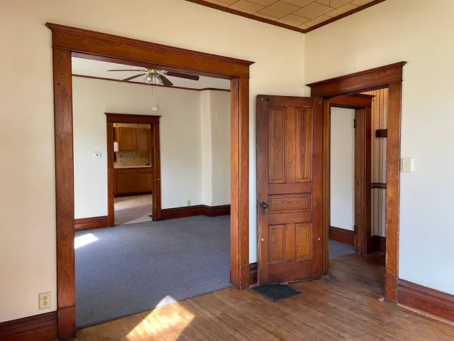 wooden floor and closet in a room
