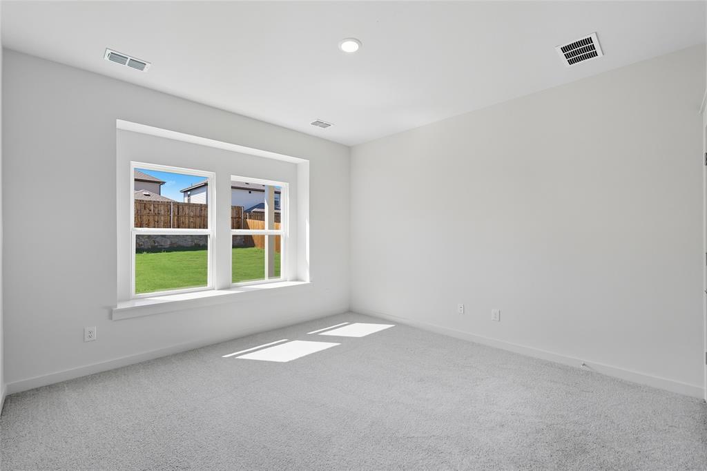 519 Martell Road Lowry Crossing, TX 75407 - Photo 12 of 35 an empty room with a window