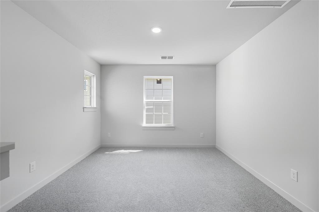 519 Martell Road Lowry Crossing, TX 75407 - Photo 21 of 35 an empty room with a window