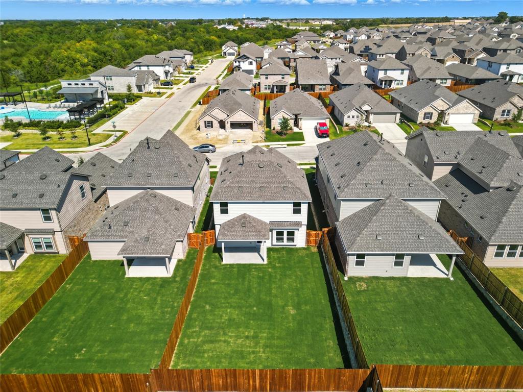 519 Martell Road Lowry Crossing, TX 75407 - Photo 31 of 35 an aerial view of residential houses with outdoor space