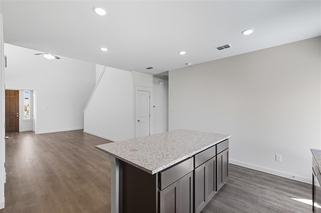 519 Martell Road Lowry Crossing, TX 75407 - Photo 6 of 35 an empty room with wooden floor