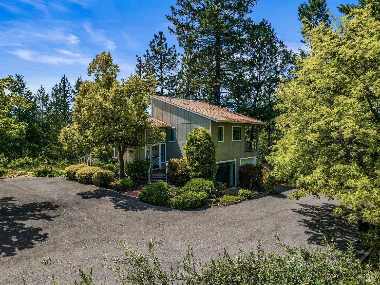 625-629 Hill Road Angwin, CA 94508 - Photo 35 of 64 front view of a house with a tree