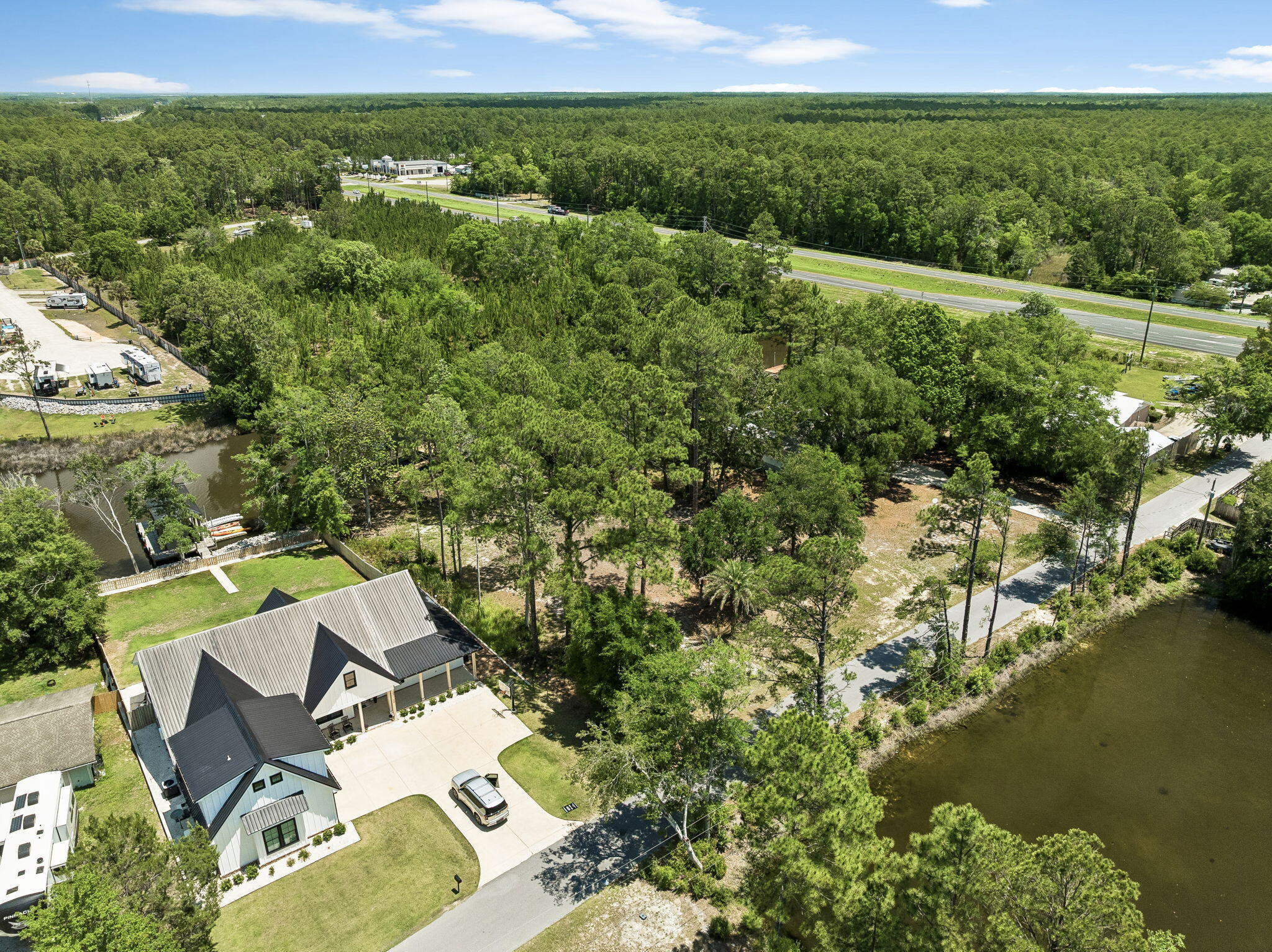 92 Waterside Lane Freeport, FL 32439 - Photo 10 of 28 a view of a lake with a yard