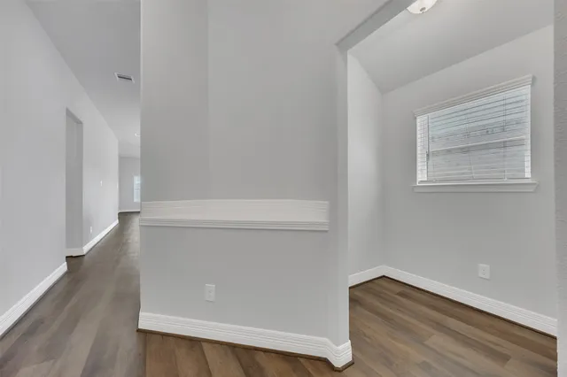 a view of an empty walk in closet