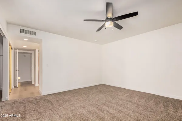 a view of a room with a hallway