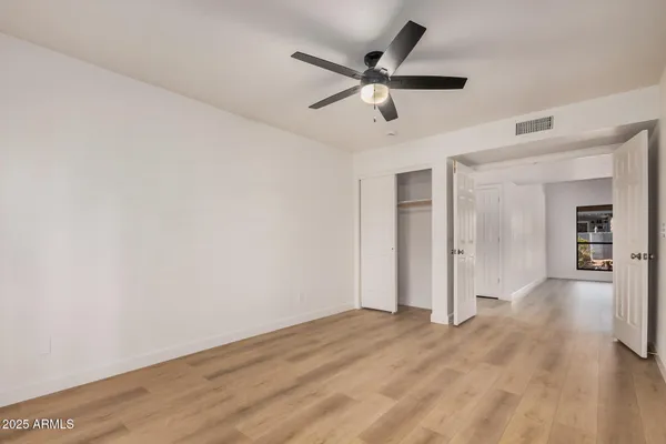 a view of a livingroom with a ceiling fan