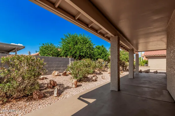 a view of a porch with seating space