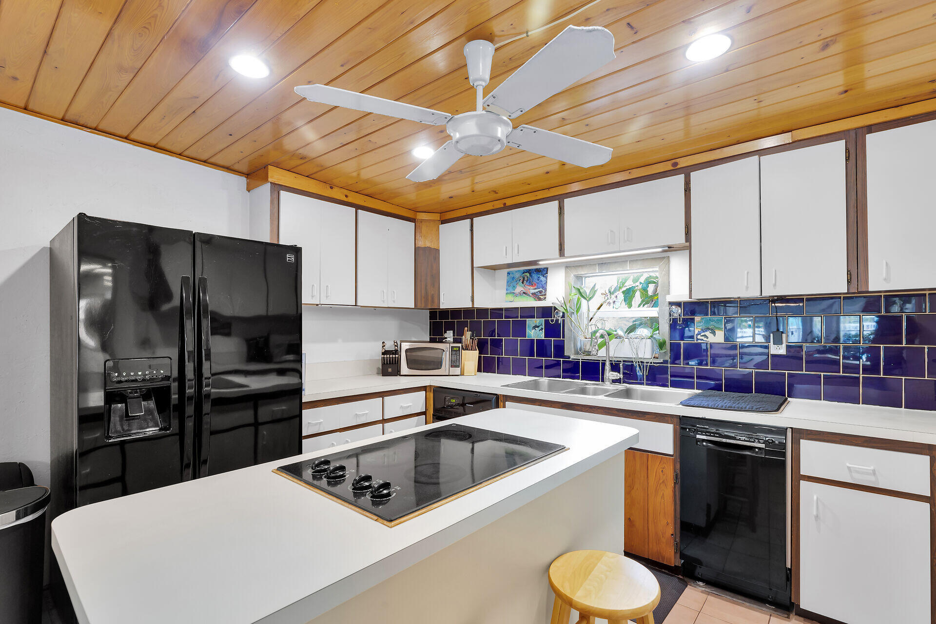 16 Janet Place Key Largo, FL 33037 - Photo 14 of 29 a kitchen with a sink a stove and refrigerator